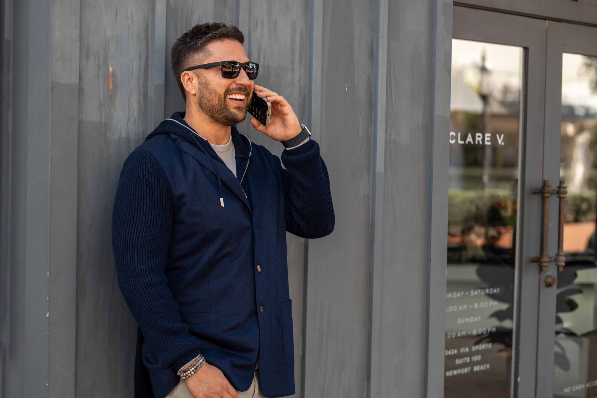Neil Anders seated outdoors in Newport Beach